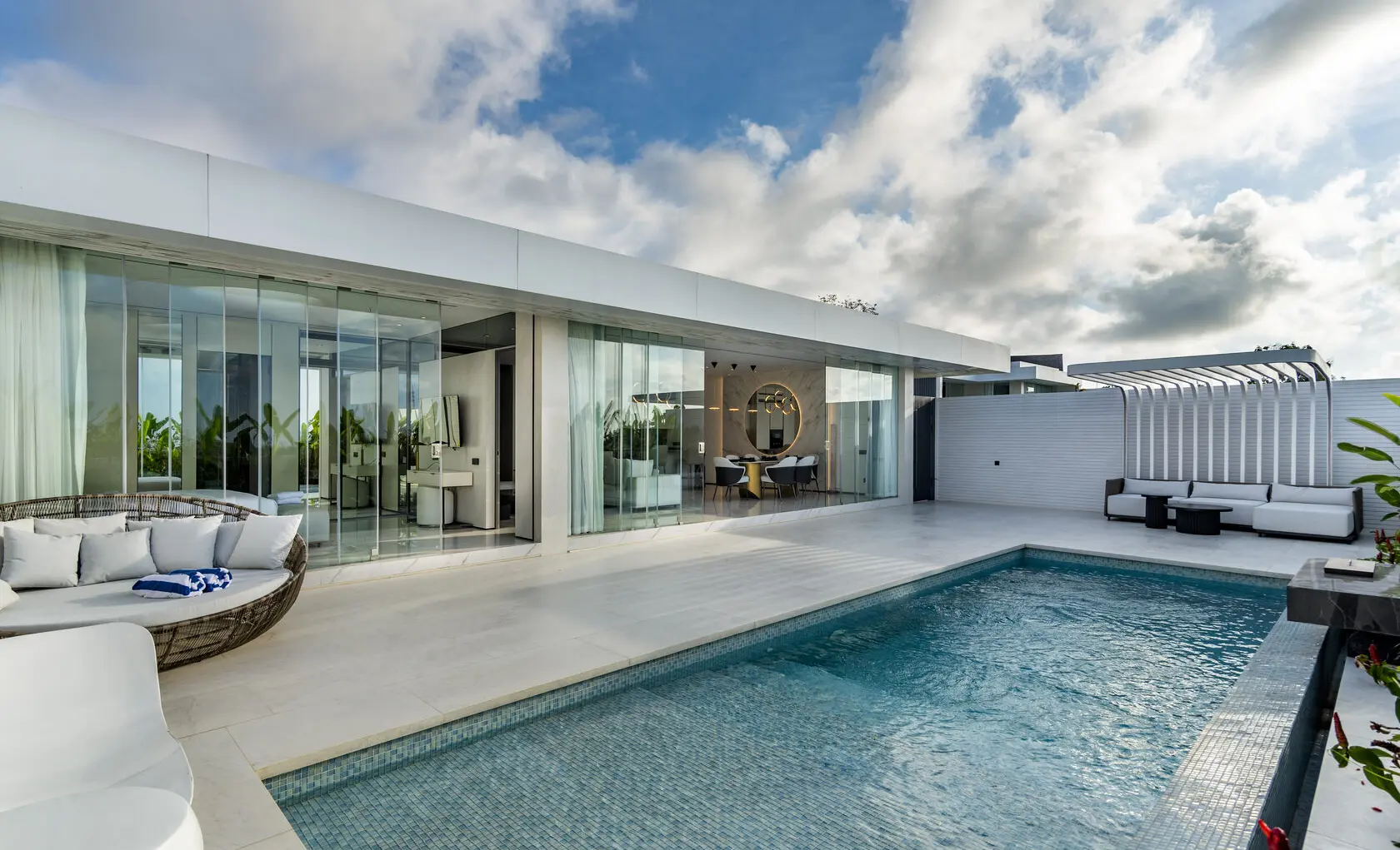 Private pool and glass facade of the one-bedroom villa